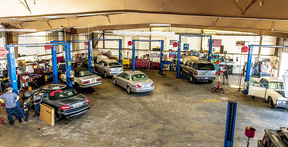 Service bays with cars on lifts
