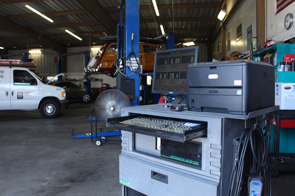 Shop interior with tool cart and lifts